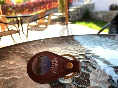 a pair of sandals sitting on top of a table at Vila Rila in Sapareva Banya