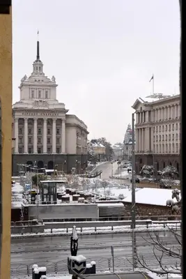 a view of a city with a large building at Santa Sofia in Sofia