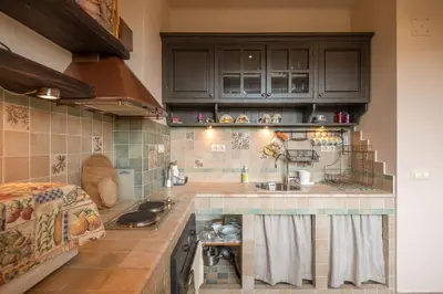a kitchen with a sink and a counter top at Kings Park Boutique Apartment in Sofia