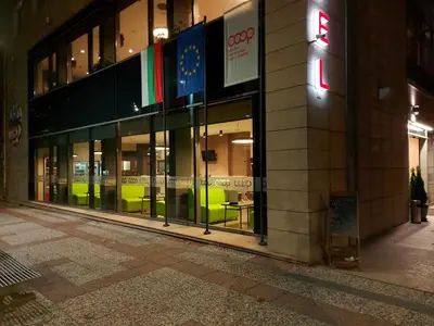 a store front of a building at night at Hotel Puldin COOP in Plovdiv
