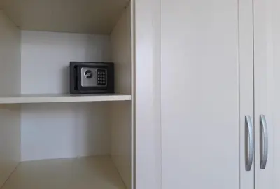 a small microwave sitting on a shelf in a kitchen at Apartment in Belvedere Holiday Club 550 m from ski lift in Bansko