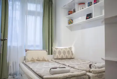 a small room with a couch and a window at Luxury suite near NDK and Viotosha blvd in Sofia
