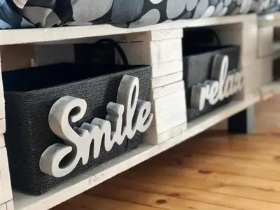 a shelf with a smile sign on it at Spacious modern vintage flat in the heart of Sofia in Sofia
