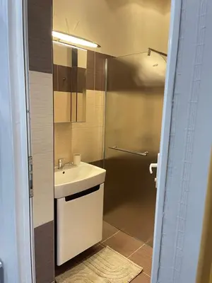 a bathroom with a sink and a shower at Dara House in Plovdiv