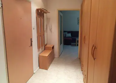 a hallway leading to a room with a room with a room at Faith,Hope and Love apartment in Sofia