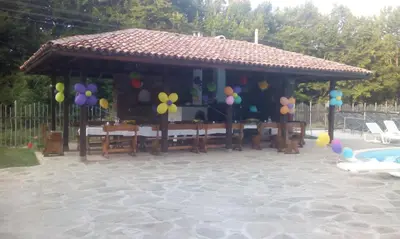 a pavilion with a gazebo with balloons at Vidima Apartment Hotel in Apriltsi