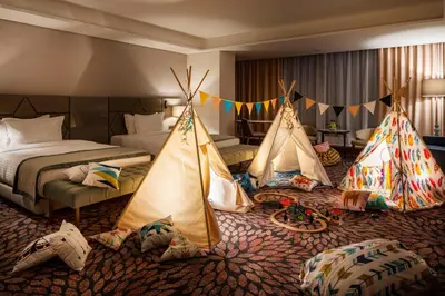 a hotel room with two beds and tents at Grand Hotel Millennium Sofia in Sofia