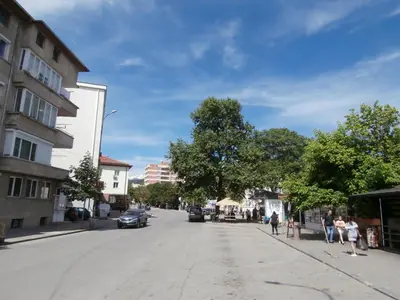 a city street with people walking down the street at Apartments in House Silent Nature in Sandanski