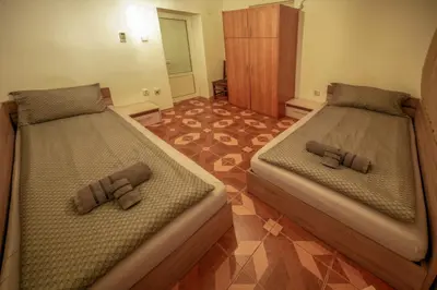 two beds in a room at Central Halls apartment in Sofia