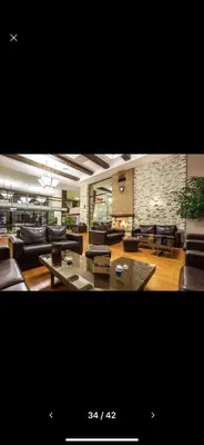 a large living room with couches and tables at Terra Complex SPA apartment 1 bedroom suite in Razlog