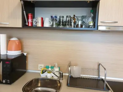 a kitchen counter with a sink and a sink at Private Studio in Aspen Golf and Ski Resort in Razlog
