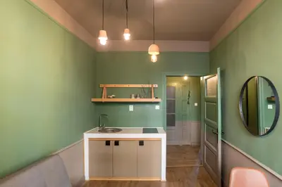 a bathroom with a sink and a mirror at Beautiful best location apartment Green Mouse in Plovdiv