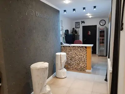 a store with a counter and two stools in a room at Апартамент КАРЛИН in Pamporovo
