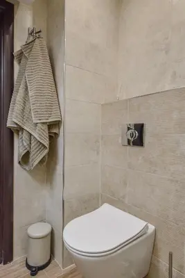 a bathroom with a toilet and a shower at The Grunge Spot - Charming NEW 1-Bedroom by Flat Mаnager in Sofia