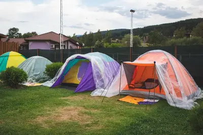 a group of tents sitting in the grass at Thermal Camping Velingrad in Velingrad