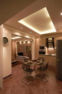 a kitchen with a table and chairs in a room at Brown Cottage Apartment in Sofia