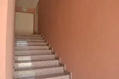 a set of stairs in a building with a door at Hotel West in Blagoevgrad