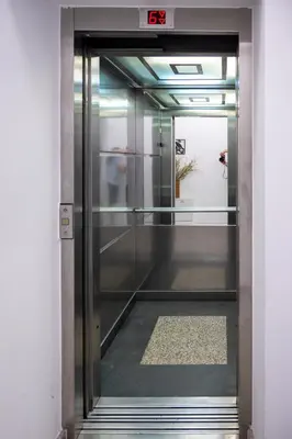 an elevator in a building with the door open at Sunny Studio with a view in TOP Center in Sofia