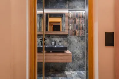 a bathroom with a sink and a mirror at Sofia Dream Apartment - The Library - 3-BDR, 2-BTHR by Flat Mаnager in Sofia