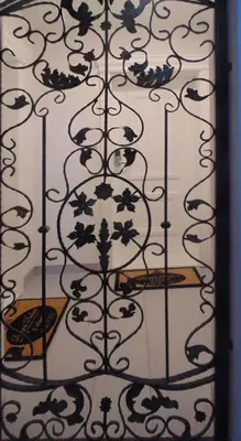 a door with a black and white wrought iron gate at Paradise Center Premium Suite 2 in Sofia