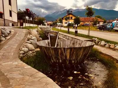 a metal bowl sitting on the side of a street at Luxury Downtown Apartment - Gondola in Bansko