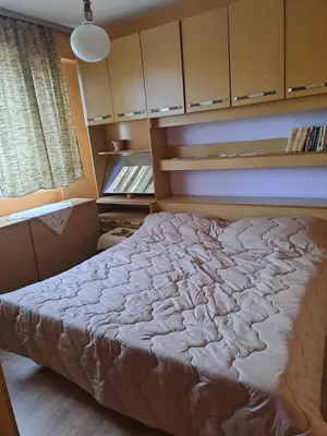 a bedroom with a large bed in a room at Apartment Milevi in Teteven