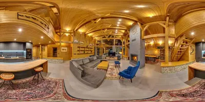 a large room with a couch and chairs in a building at Mountain Hawk Park in Bansko