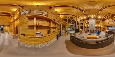 a large room with a large wooden building at Mountain Hawk Park in Bansko