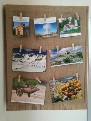 a bunch of pictures hanging on a wall at Studio Anastasia in Sapareva Banya