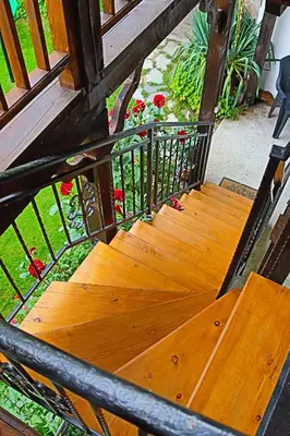 an overhead view of a wooden staircase with flowers at GREEN HOUSE - Попниколови in Sapareva Banya