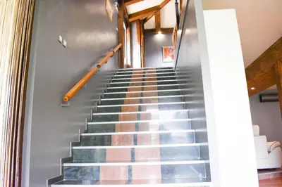 a set of stairs in a house at Casafamiglia in Prolesha