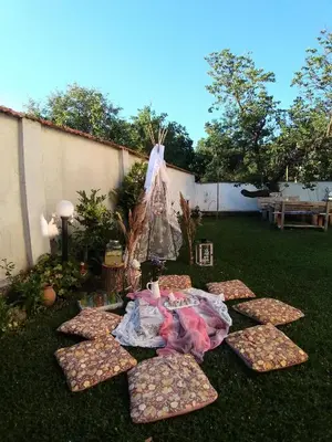 a group of pizzas on the grass in a yard at вила Топи in Kaloyanovo