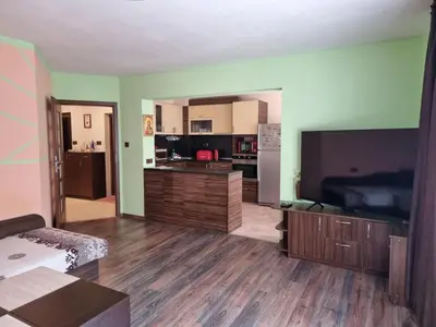 a large living room with a large flat screen tv at Apartment Lozenets in Sofia