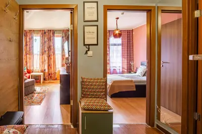 a room with a bedroom and a bed and a door at Gondola 1 BDRM Flat in Cedar Lodge IV (D2) in Bansko