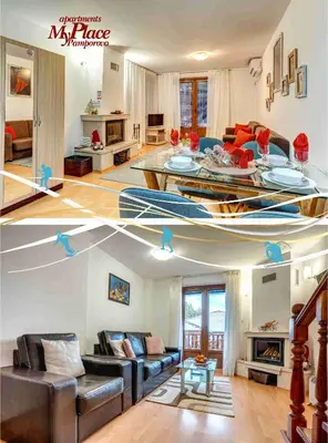 a living room with a couch and a table at MyPlace Pamporovo апартаменти за отдих in Pamporovo