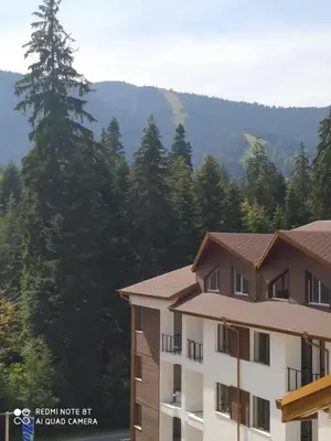 a view of the mountains from a hotel at Апартамент С-59 в Апарт-хотел Боровец Гардънс in Borovets