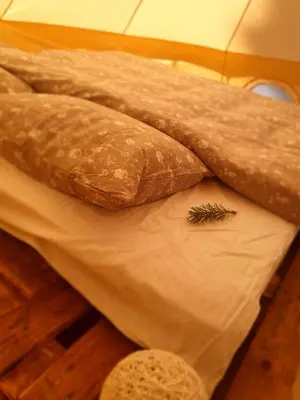 a pile of bread with a dill on top of it at Zarevo Glamping in Skobelevo
