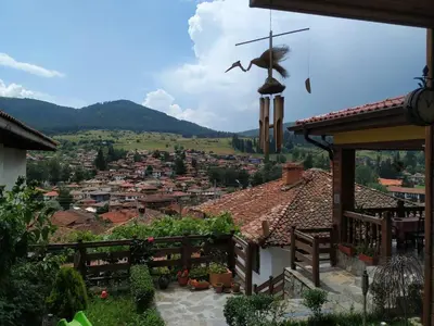 a view of a city from the roof of a house at Емили Фемили Хаус in Koprivshtitsa