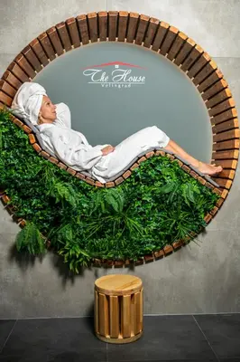 a painting of a woman laying in a wicker mirror at 