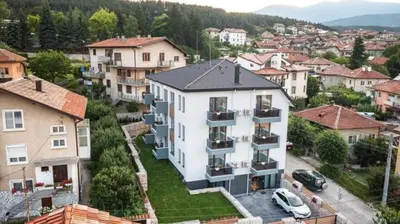 an aerial view of a building in a city at 