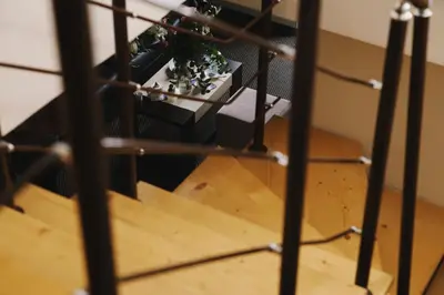 an overhead view of a staircase with a plant at Borovets Green Hotel in Borovets