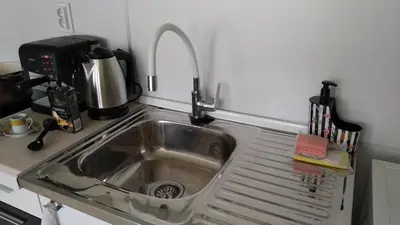 a kitchen counter with a sink and a mixer at Snow Dreams 1 Grand Monastery in Pamporovo