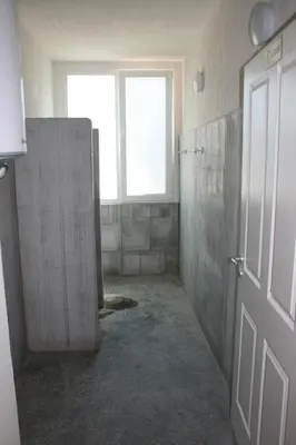 a bathroom with a shower and a window in it at Hostel Iliana Общежитие Илияна in Elin Pelin