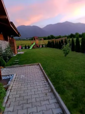 a view of a backyard with a playground at Mountain villa Jordan- with JACUZZI in Razlog