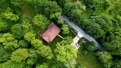 an overhead view of a house in the middle of a forest at Къща за гости Амая - Сандански in Sandanski