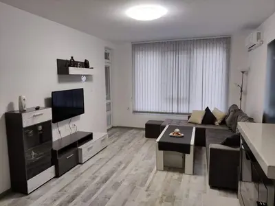 a living room with a couch and a table at Apartment Anelia 3 in Plovdiv
