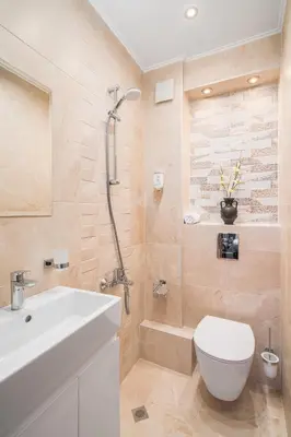 a bathroom with a shower and a toilet and a sink at АРТ СТУДИО СОФИЯ in Sofia