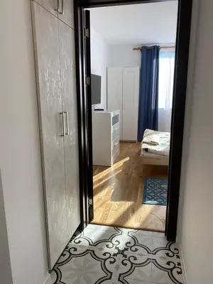 a mirror in a room with a bedroom at Bendida Central in Velingrad