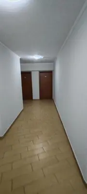 an empty room with white walls and a wooden floor at iVAVev CedarLodge Bansko in Bansko