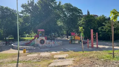 a park with a playground with a slide at Thea Apart in Sandanski